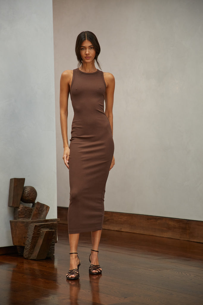 Chocolate Brown Alex Dress This premium ribbed dress has a cutout back and a fitted silhouette to offer a tasteful contour of the curves. 