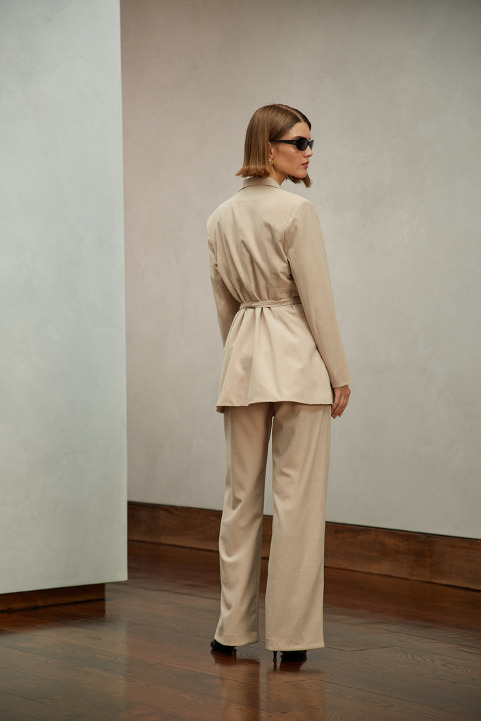 Dusty Pink Kat Trouser Dual pleated mid-rise trousers featuring a straight, relaxed fit. Pockets at back with horn buttons. Includes a self-fabric detachable belt. Style with The Rhodes Blazer  | Also available in BlackThis item is FINAL SALE.