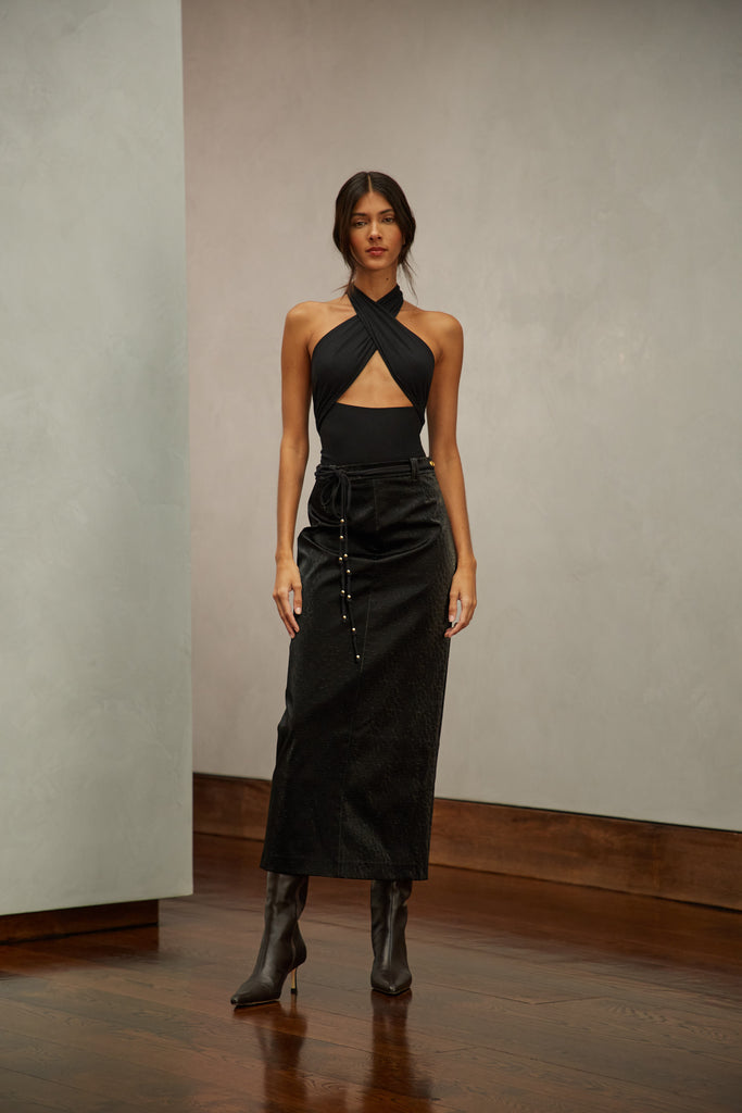 Black Jamie Wrap Create countless looks with this sustainable premium stretch modal wrap. Includes beaded piece to be paired as a belt, wrapped around neck, tied in hair....the possibilities are endless.