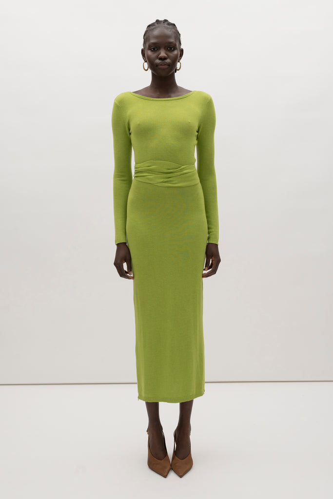 Leaf Bambi Knit Dress This wrap dress features a fixed belt at waist and plunging open back. Crafted from a luxe cashmere blend, hidden zips at sides provide option to vent. Size down for a snug fit.We recommend ordering your usual size.