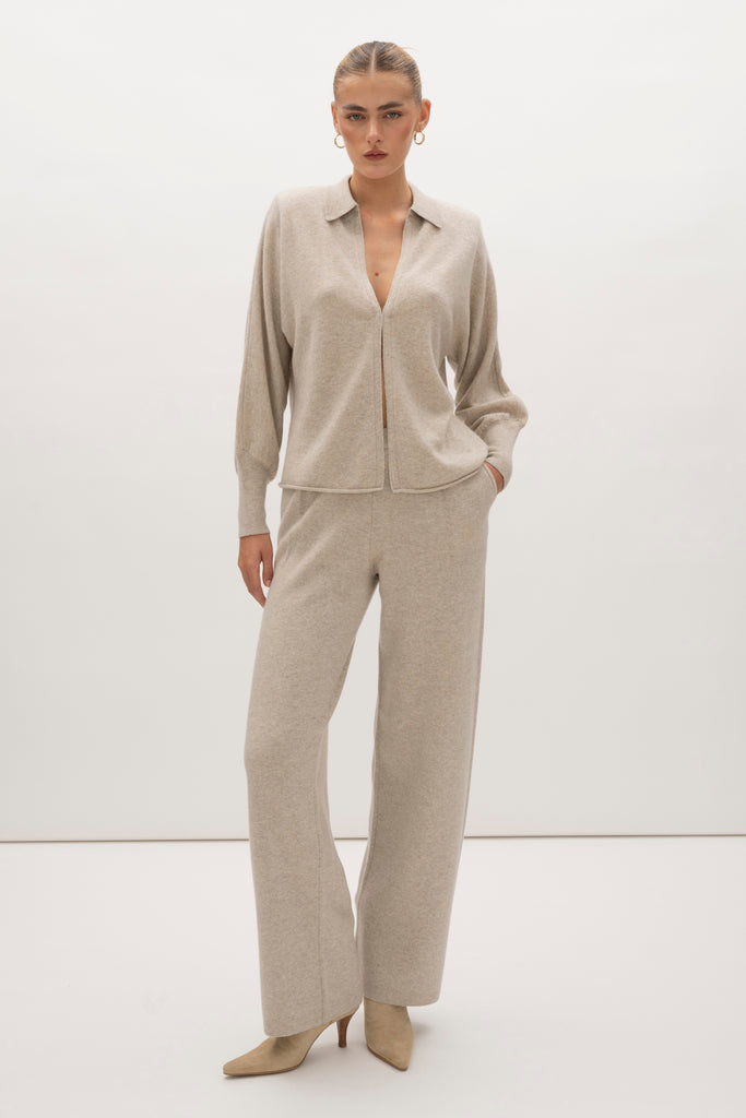 Oatmeal Beverly Trouser Delicately soft and consciously crafted, a versatile piece designed for ultimate comfort.-Wide-leg silhouette for a relaxed fit-Elastic waistband-Center front pleats-Side pockets-Back patch pockets🐑 Made with Good Cashmere Standard® wool to support the welfare of cashmere goats We recommend ordering your usual size.Styled with the Nico Shirt