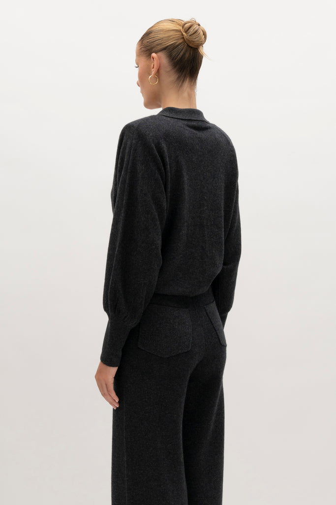 Charcoal Beverly Trouser Delicately soft and consciously crafted, a versatile piece designed for ultimate comfort.-Wide-leg silhouette for a relaxed fit-Elastic waistband-Center front pleats-Side pockets-Back patch pockets🐑 Made with Good Cashmere Standard® wool to support the welfare of cashmere goats We recommend ordering your usual size.Styled with the Nico Shirt