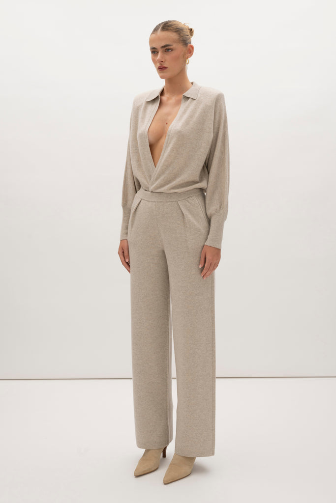 Oatmeal Beverly Trouser Delicately soft and consciously crafted, a versatile piece designed for ultimate comfort.-Wide-leg silhouette for a relaxed fit-Elastic waistband-Center front pleats-Side pockets-Back patch pockets🐑 Made with Good Cashmere Standard® wool to support the welfare of cashmere goats We recommend ordering your usual size.Styled with the Nico Shirt