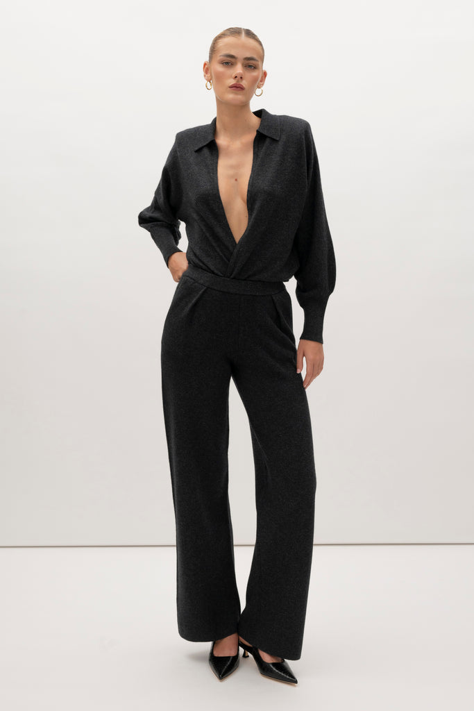 Charcoal Beverly Trouser Delicately soft and consciously crafted, a versatile piece designed for ultimate comfort.-Wide-leg silhouette for a relaxed fit-Elastic waistband-Center front pleats-Side pockets-Back patch pockets🐑 Made with Good Cashmere Standard® wool to support the welfare of cashmere goats We recommend ordering your usual size.Styled with the Nico Shirt