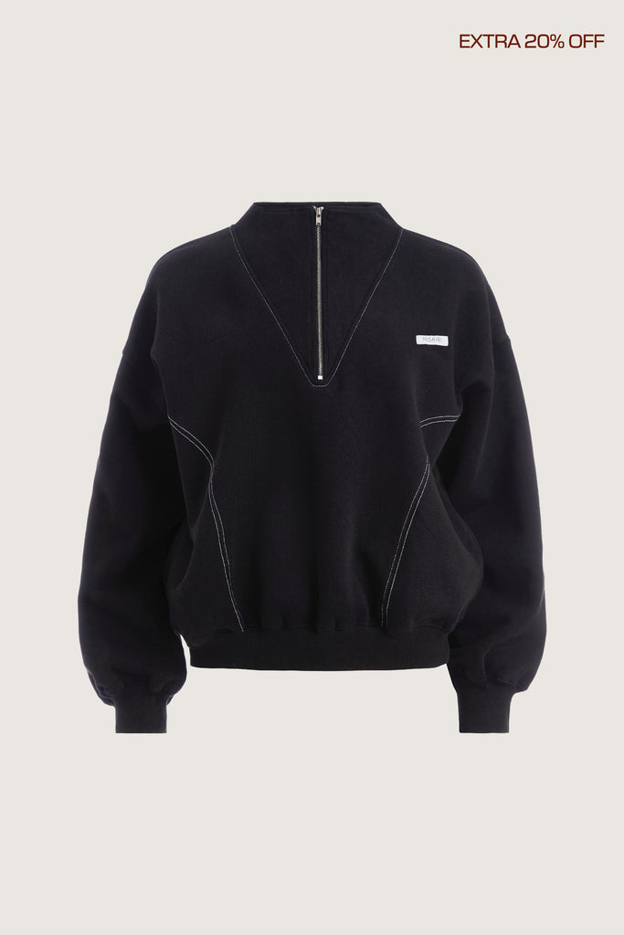 Black Henry Sweatshirt This half-zip pullover features a ribbed v-neckline, branded patch logo and side pockets. Fits true to size with an oversized style. Models are wearing a size XS.*FINAL SALE. Please reference our return & exchange policy here.Extra 20% off auto-applied in cart.