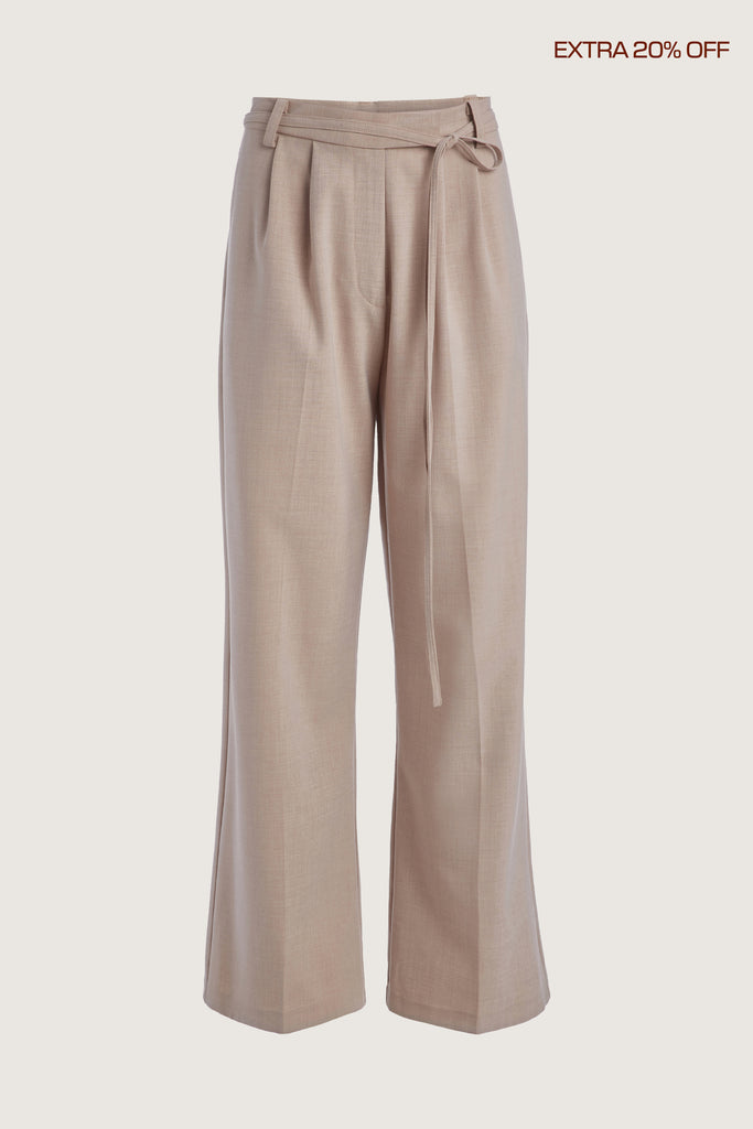 Dusty Pink Kat Trouser Dual pleated mid-rise trousers featuring a straight, relaxed fit. Pockets at back with horn buttons. Includes a self-fabric detachable belt. Ana is 5’9