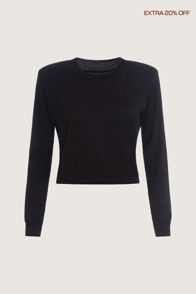  Margot LS Sweater -Crewneck long sleeve sweater -Crafted in a lightweight silk and cashmere blend -Single-layer ribbing at neckline, cuffs, and hem-Subtle shoulder structure with removable, self-covered shoulder pads-Interior shoulder seam with discreet snaps to remove pads Ingryd is 5'10