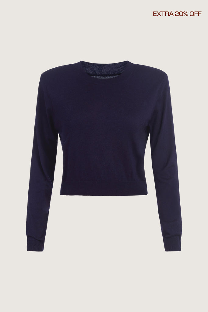  Margot LS Sweater -Crewneck long sleeve sweater -Crafted in a lightweight silk and cashmere blend -Single-layer ribbing at neckline, cuffs, and hem-Subtle shoulder structure with removable, self-covered shoulder pads-Interior shoulder seam with discreet snaps to remove pads Ingryd is 5'10