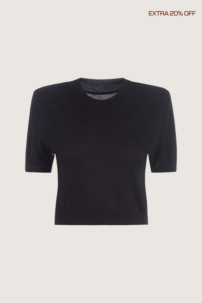  Margot SS Sweater -Crewneck short sleeve sweater -Crafted in a lightweight silk and cashmere blend -Single-layer ribbing at neckline, cuffs, and hem-Subtle shoulder structure with removable, self-covered shoulder pads-Interior shoulder seam with discreet snaps to remove pads Ingryd is 5'10