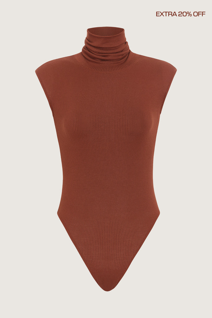 Pecan Penny Bodysuit This buttery soft sleeveless ribbed turtleneck bodysuit showcases a sleek silhouette for a versatile wardrobe staple.Fits true to size. Size down for an even more snug fit.*FINAL SALE. Please reference our return & exchange policy for Bodysuits.Extra 20% off auto-applied in cart.