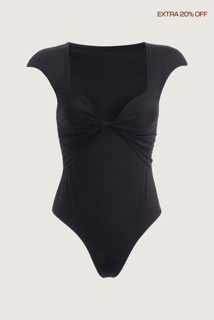 Black Rae Bodysuit This bodysuit features a twisted ruched bust, fitted cap-sleeve shoulder and timeless silhouette. Fits true to size.*FINAL SALE. Please reference our return & exchange policy here.Extra 20% off auto-applied in cart.