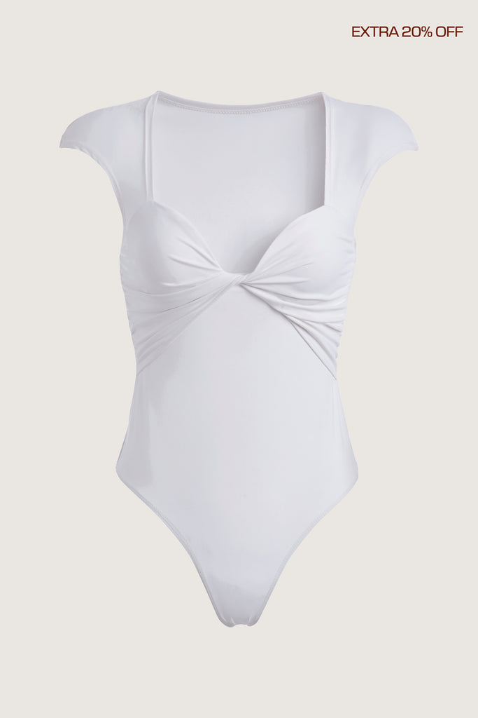 White Rae Bodysuit This bodysuit features a twisted ruched bust, fitted cap-sleeve shoulder and timeless silhouette. Fits true to size.*FINAL SALE. Please reference our return & exchange policy here.Extra 20% off auto-applied in cart.