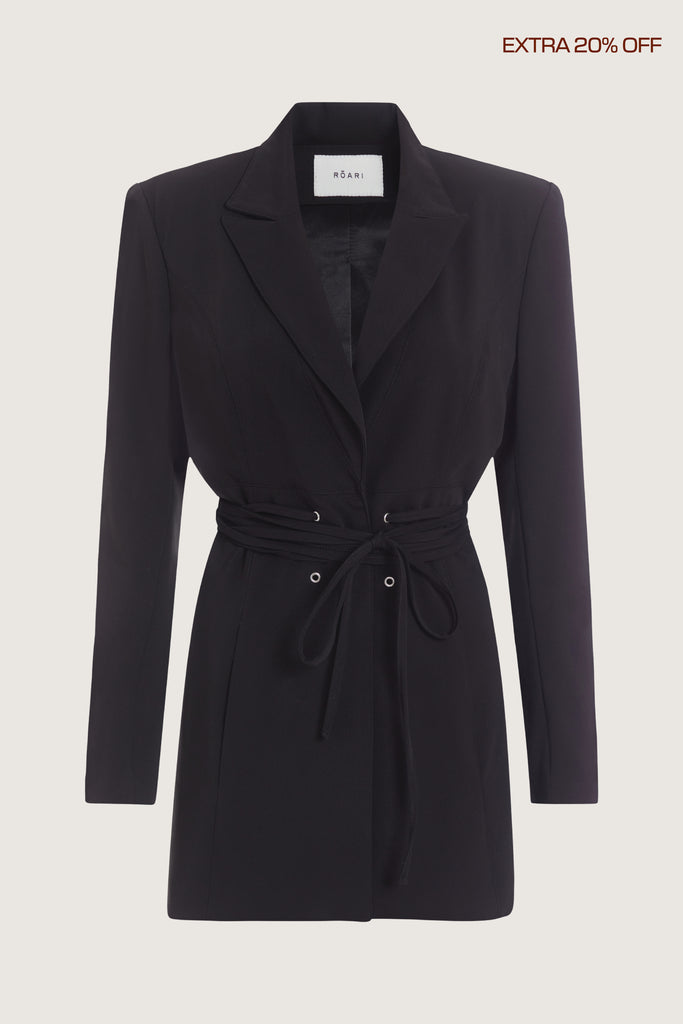  Rhodes Blazer This mid-length blazer features a detachable waist tie, allowing you to create a range of looks. The tailored single- breasted style features shoulder pads and front welt pockets. The Kat Trouser compliments the blazer perfectly.Styled with the Zoey Tank & Beverly TrouserPairs with The Kat Trouser*FINAL SALE. Please reference our return & exchange policy here.Extra 20% off auto-applied in cart.