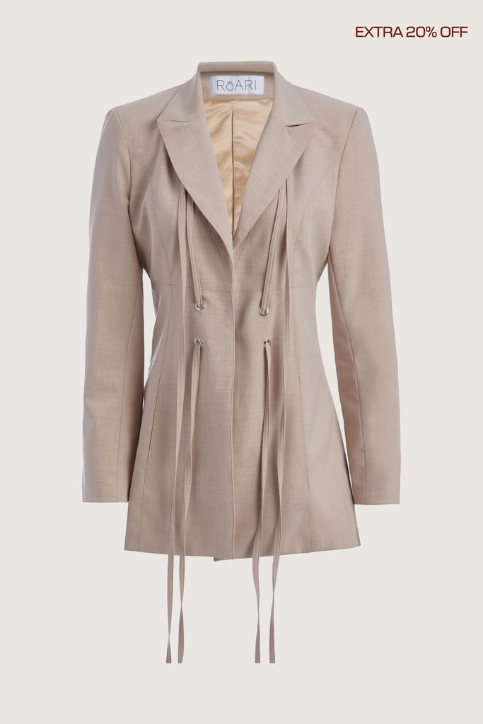 Dusty Pink Rhodes Blazer This mid-length blazer features a detachable waist tie, allowing you to create a range of looks. The tailored single- breasted style features shoulder pads and front welt pockets. The Kat Trouser compliments the blazer perfectly.Ana is 5’9