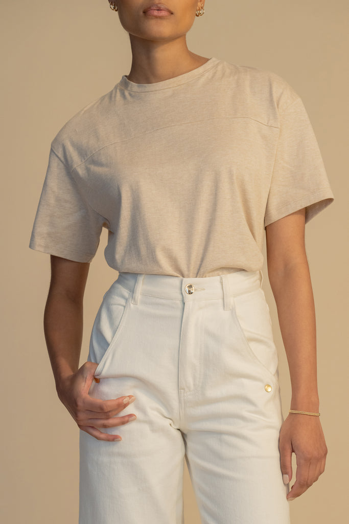 Oatmeal DANNY TEE An oversized drop shoulder t-shirt made from 100% lightweight cotton featuring a silk RŌARI branded patch at back of neck. Cut with a boxy fit.Light Grey Danny Tee styled with the Penny Bodysuit. 
