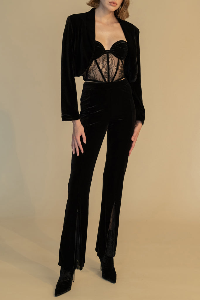 Black ROSE PANT High-rise straight-leg velvet pant featuring hidden zips at front for option to reveal a lace flared silhouette. 