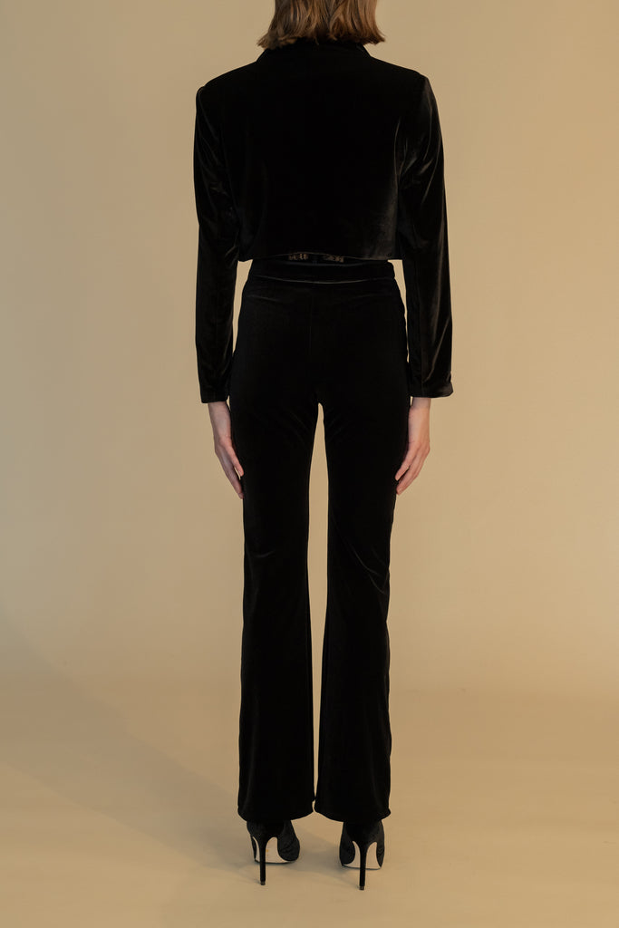Black ROSE BOLERO This cropped open front bolero-style jacket is cut from rich velvet fabric with fixed lapels and built-in shoulder pads. 