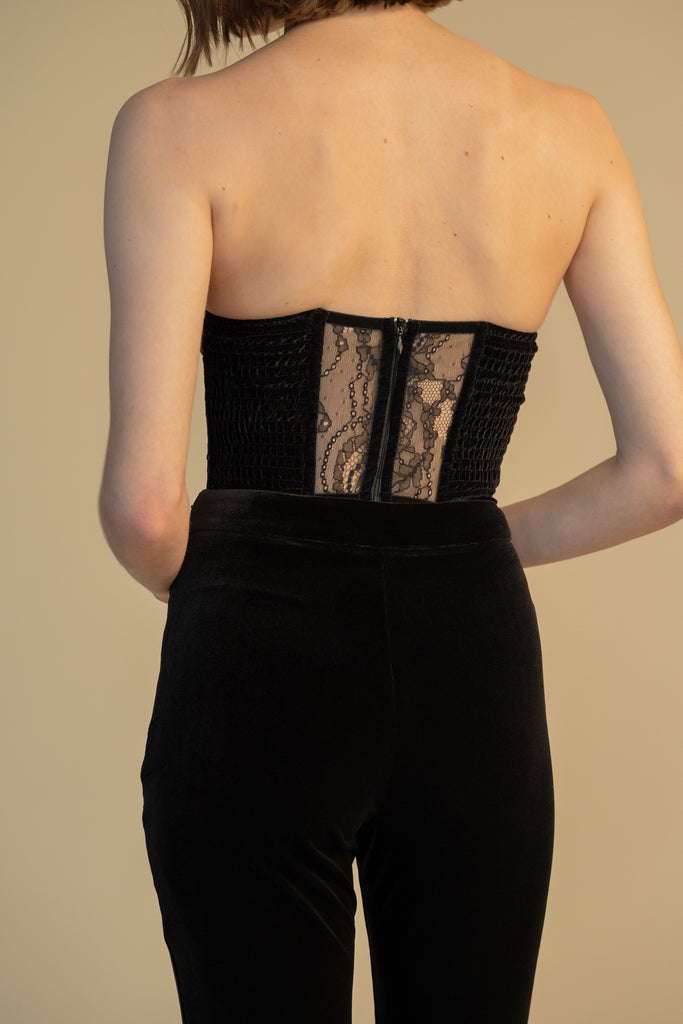 Black ROSE CORSET This strapless corset features a lace bodice with contrast velvet contoured boning, moldable wire cups, and shirred back panels to ensure a snug yet flexible fit. Slightly cropped with a v-front silhouette. 