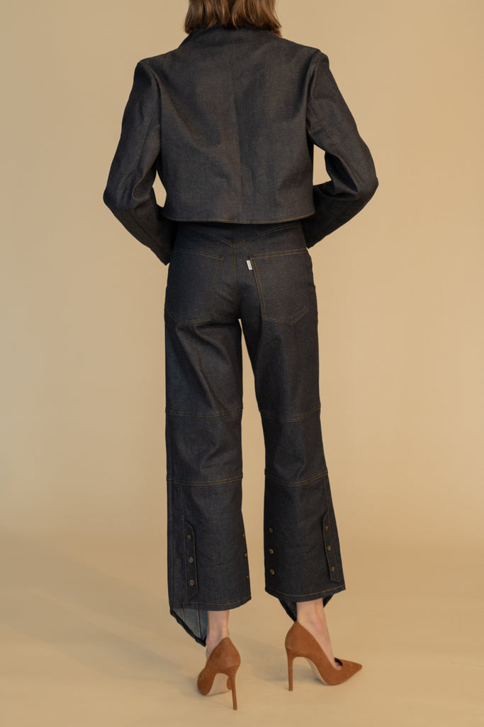 Raw Indigo Sasha Stretch Bolero This bolero jacket is cut from a cotton denim elastane blend. It features an open front lapel and cropped length.