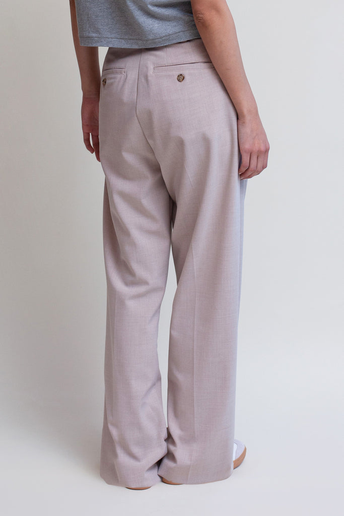 Dusty Pink Kat Trouser Dual pleated mid-rise trousers featuring a straight, relaxed fit. Pockets at back with horn buttons. Includes a self-fabric detachable belt. *Sale merchandise is exchangeable for size or store credit. 