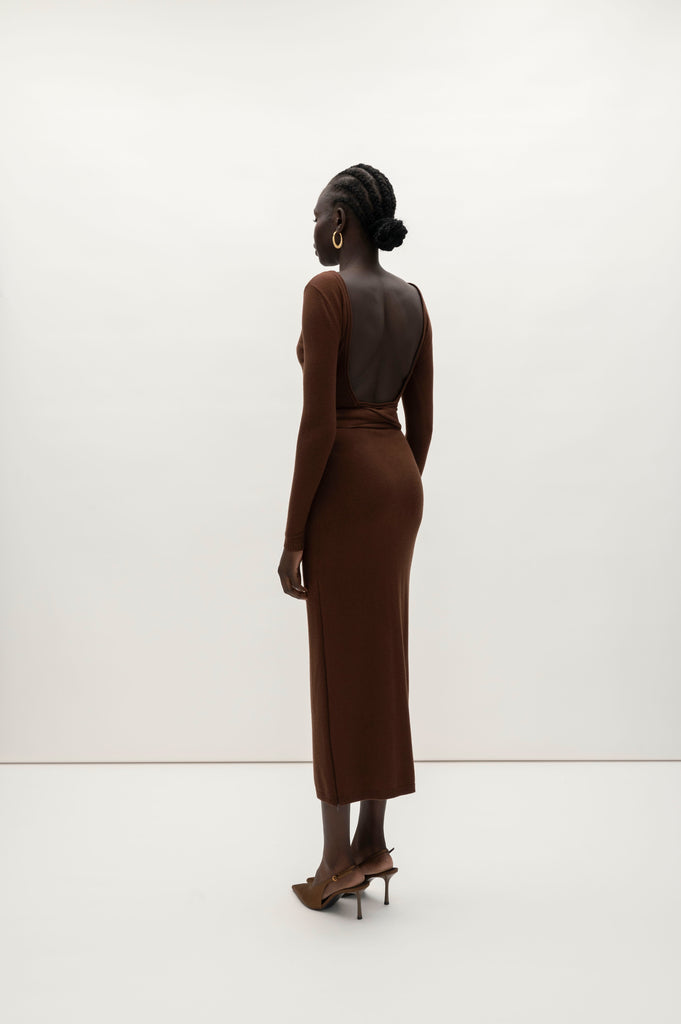 Chocolate Bambi Knit Dress This wrap dress features a fixed belt at waist and plunging open back. Crafted from a luxe cashmere blend, hidden zips at sides provide option to vent. Size down for a snug fit.We recommend ordering your usual size. 
