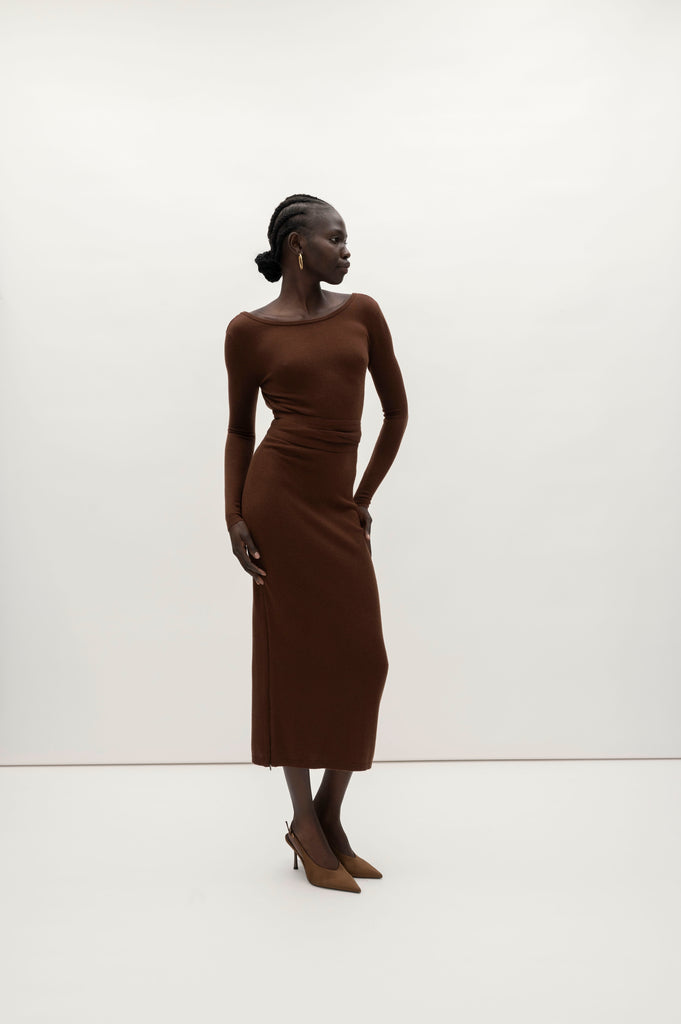 Chocolate Bambi Knit Dress This wrap dress features a fixed belt at waist and plunging open back. Crafted from a luxe cashmere blend, hidden zips at sides provide option to vent. Size down for a snug fit.We recommend ordering your usual size. 