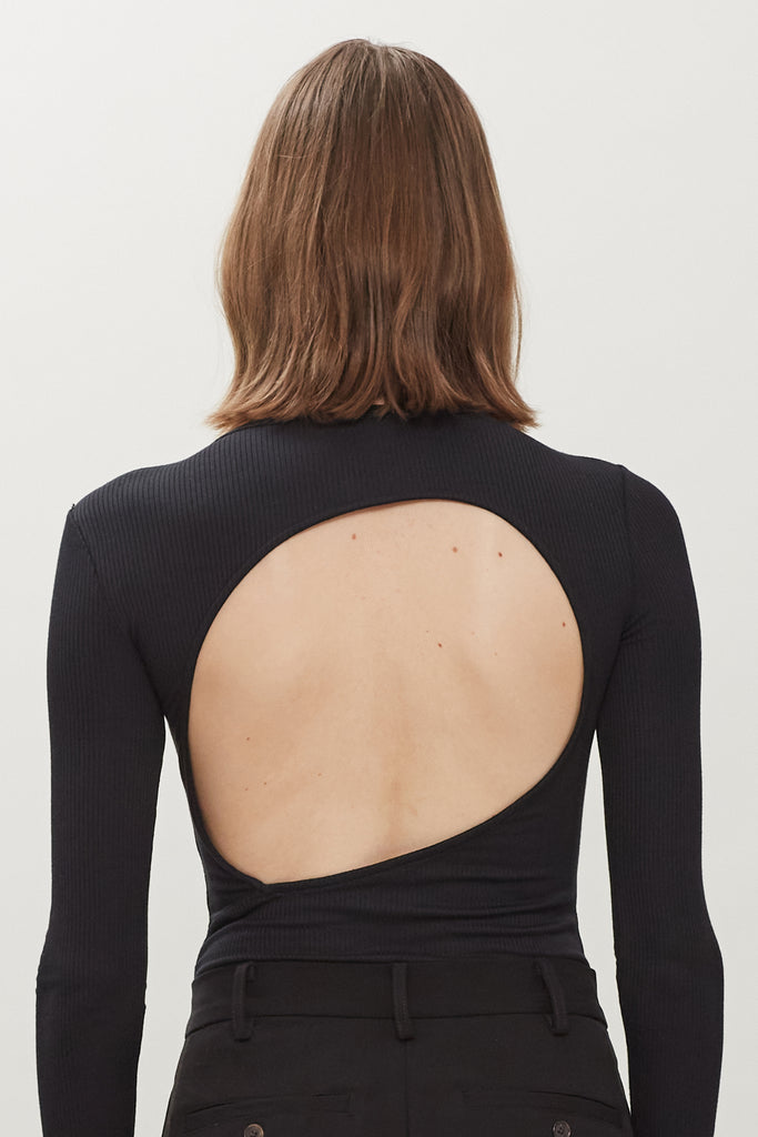 Black Baby Bodysuit This buttery soft long sleeved bodysuit features a sleek silhouette with a crew neckline and an asymmetrical bold back cutout. *Please reference our return & exchange policy for Bodysuits.