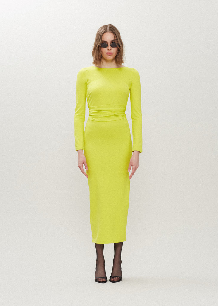 Lime Punch Bambi Dress This wrap dress features a fixed belt at waist and plunging open back. Crafted from a stretch ponte fabric, hidden zips at sides provide option to vent. Size down for a snug fit.FINAL SALE - EXCHANGE OR STORE CREDIT ONLY 
