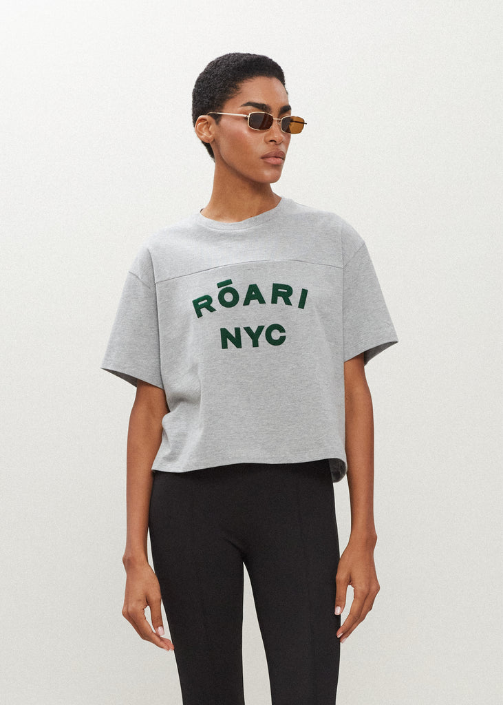 Grey Branded Danny Tee An oversized drop shoulder t-shirt made from 100% lightweight cotton featuring felt appliqué RŌARI branding. Cut with a semi-cropped boxy fit.