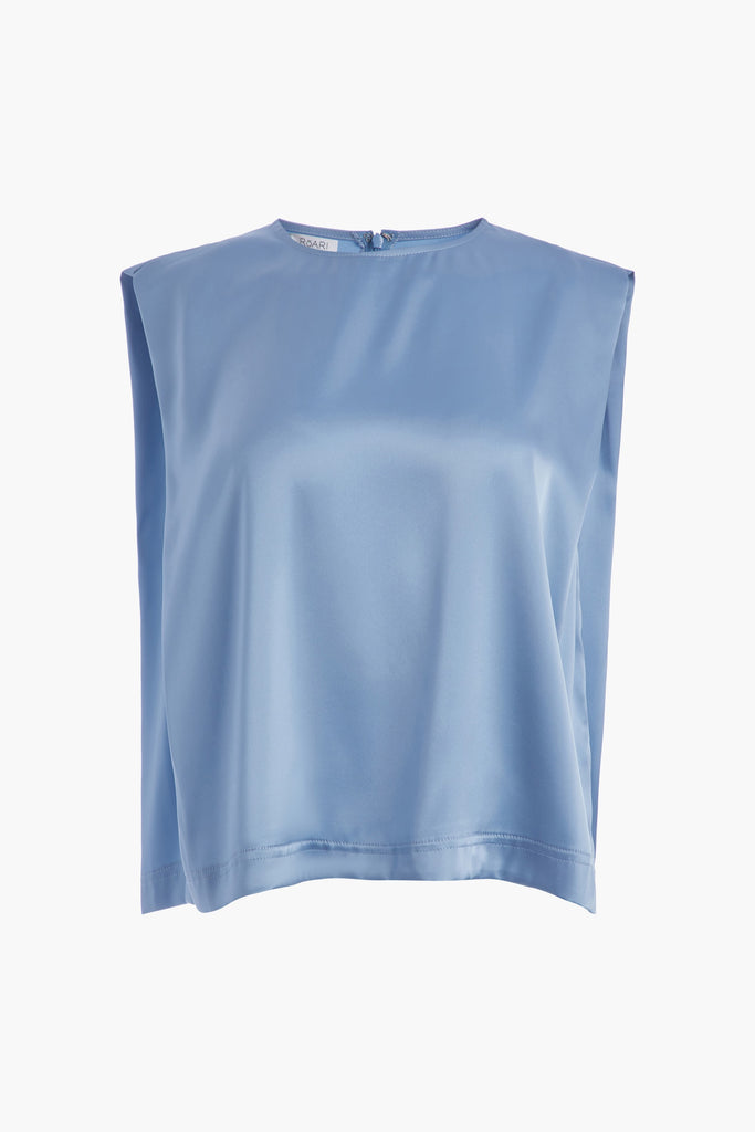 Sky BROOKE TANK Crafted from luxurious vegan silk, this muscle tee is complete with high curved neckline, shoulder-width sleeves, and a relaxed boxy shape.*All sale merchandise is exchangeable for size only. 