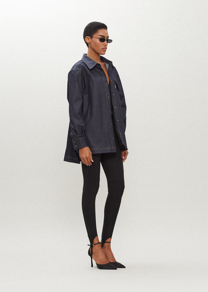 Raw Indigo Charlie Shirt This oversized button down is crafted from lightweight denim for a drapey yet structured silhouette. Its relaxed fit is finished with traditional denim stitching and horn buttons. Features a RŌARI branded deco label at chest pocket.
