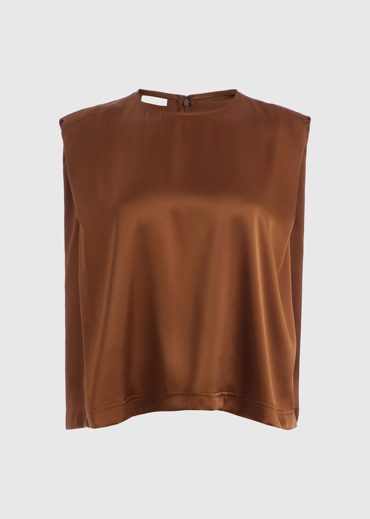 Cinnamon Brooke Tank | The Archive Crafted from luxurious vegan silk, this muscle tee is complete with high curved neckline, shoulder-width sleeves, and a relaxed boxy shape.All items within The Archive Collection are FINAL SALE.Subscribe to our newsletter to unlock an additional offer exclusive to the archive sale.