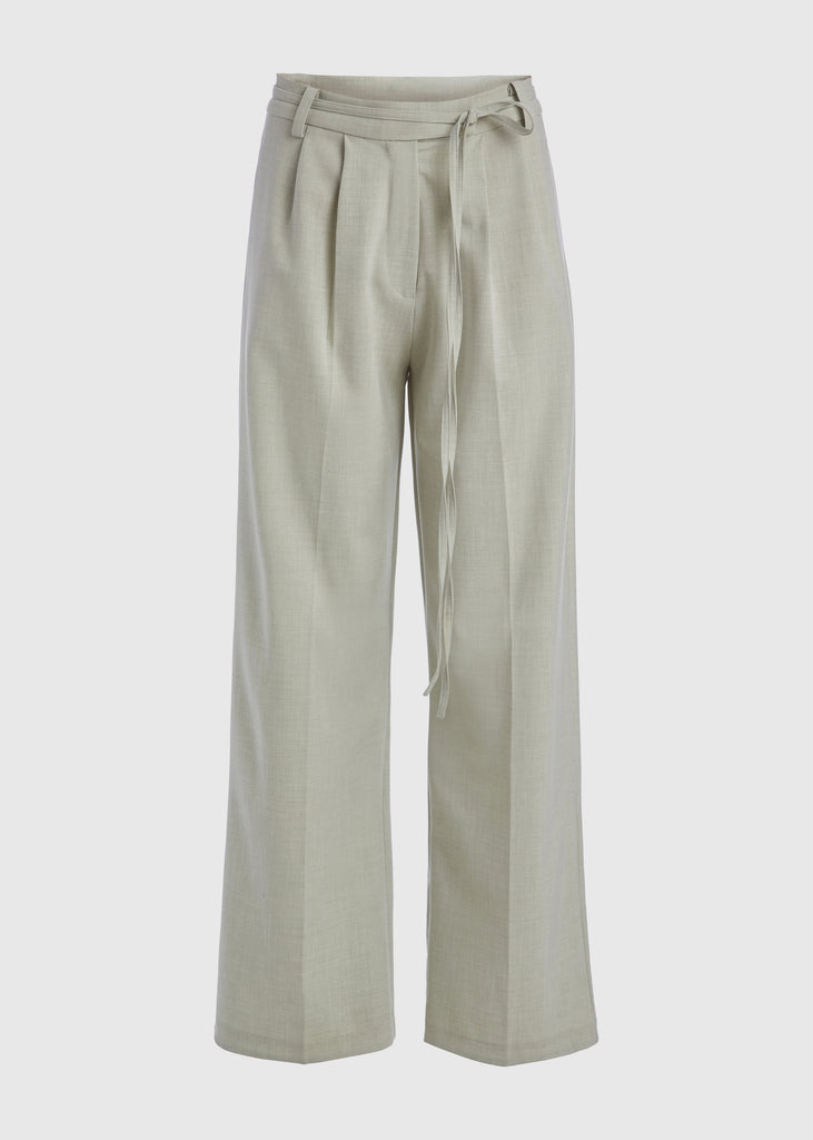 Sage Kat Trouser Dual pleated mid-rise trousers featuring a straight, relaxed fit. Pockets at back with horn buttons. Includes a self-fabric detachable belt. *Sale merchandise is exchangeable for size/color or store credit. 