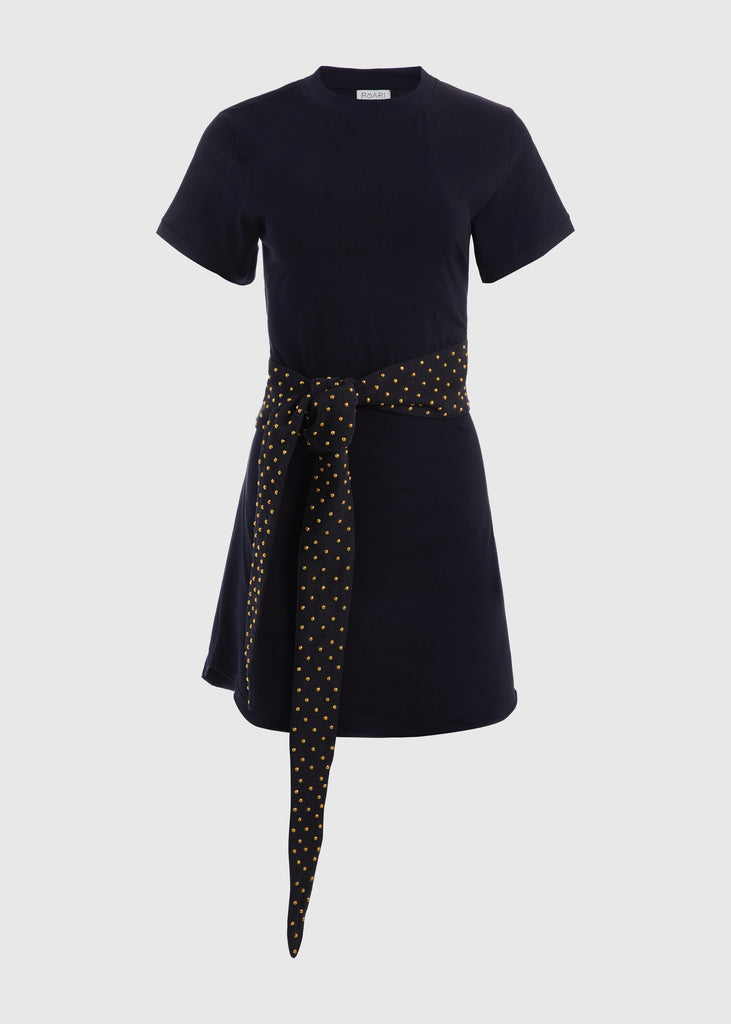 Black Lea Dress Crafted from premium cotton, this crew neck t-shirt dress boasts a curved hemline. Finished with attached denim studded belt. *Sale merchandise is exchangeable for size/color or store credit. 