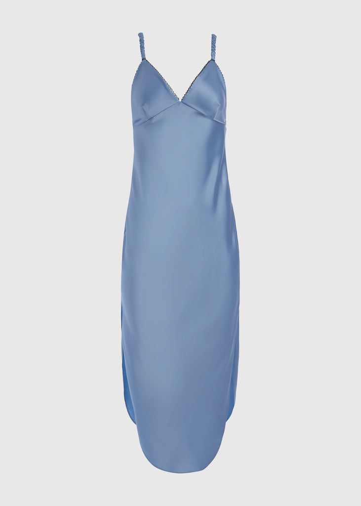 Sky Paras Dress The Paras vegan silk midi slip dress features a v-neckline with scalloped trim, bust darts, ruched elastic straps, a low cut open back, and a curved, vented hemline.*Sale merchandise is exchangeable for size/color or store credit. 