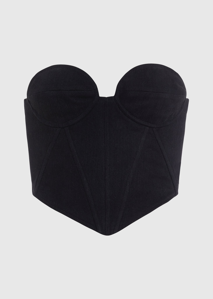 Jet Black Chloe Corset This strapless corset features a fitted denim bodice with contoured boning, moldable wiring at cups, and shirred back panels to ensure a snug yet flexible fit. Slightly cropped with a v-front silhouette.