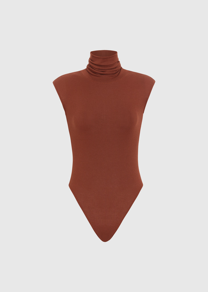 Pecan Penny Bodysuit This buttery soft sleeveless ribbed turtleneck bodysuit showcases a sleek silhouette for a versatile wardrobe staple.Styled with The Kat Trouser | The Duke JoggerFINAL SALE 