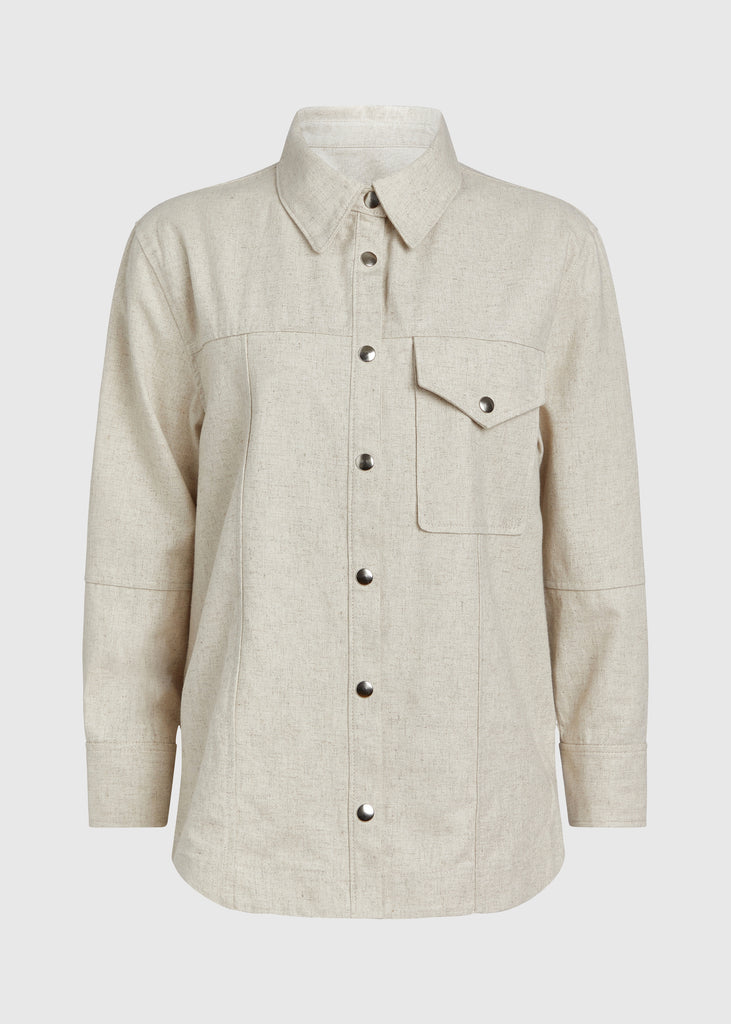 Oatmeal Louise Shirt This oversized linen button down offers a drapey yet structured silhouette finished with silver snaps. 