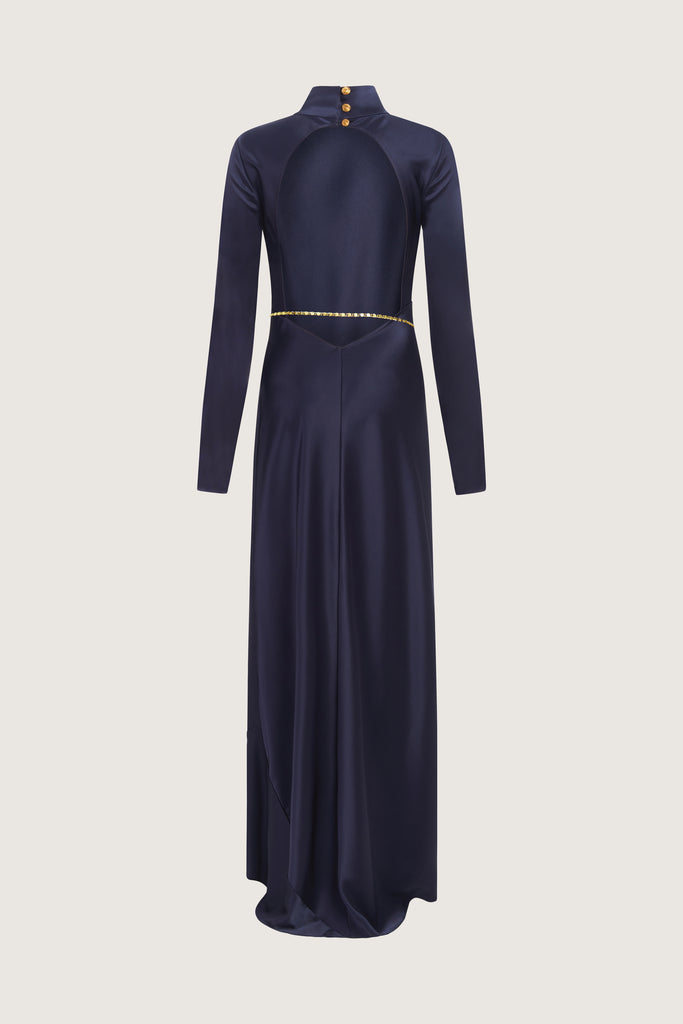 Navy Florence Dress This long sleeved satin gown is coveted for its fluid, liquid-like drape and movement. It is distinguished by a cowl turtleneck silhouette and plunging open back cutout. Includes 2 gold chain belts.Styling tip: Option to wear belt wrapped as a bracelet, or as a lariat cascading down the open back. *Please reference our return & exchange policy for Sale & Archived items.