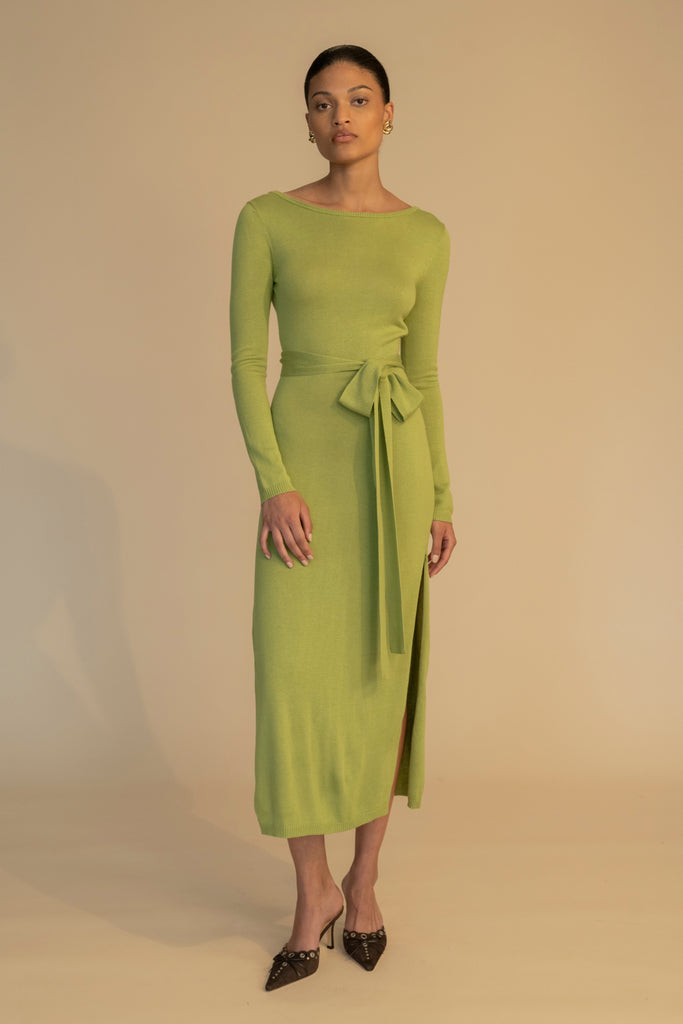 Leaf BAMBI KNIT DRESS This wrap dress features a fixed belt at waist and plunging open back. Crafted from a luxe cashmere blend, hidden zips at sides provide option to vent. Size down for a snug fit. 