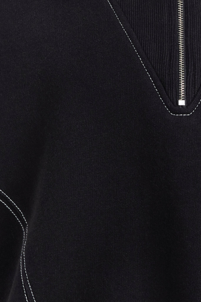 Black Archive / Henry Sweatshirt This half-zip pullover features a ribbed v-neckline, branded patch logo and side pockets. Styled with The Penny Bodysuit | The Ashley Pant *Please reference our return & exchange policy for Sale & Archived items.