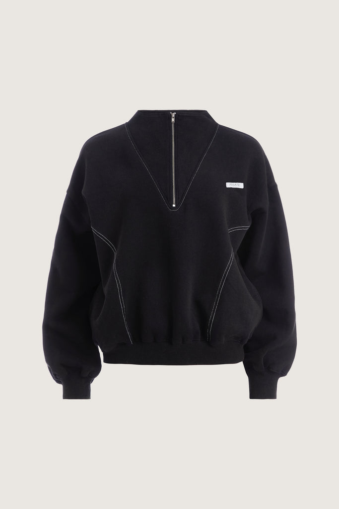 Black Henry Sweatshirt This half-zip pullover features a ribbed v-neckline, branded patch logo and side pockets. This item is FINAL SALE.