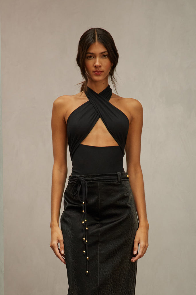 Black Jamie Wrap Create countless looks with this sustainable premium stretch modal wrap. Includes beaded piece to be paired as a belt, wrapped around neck, tied in hair....the possibilities are endless.