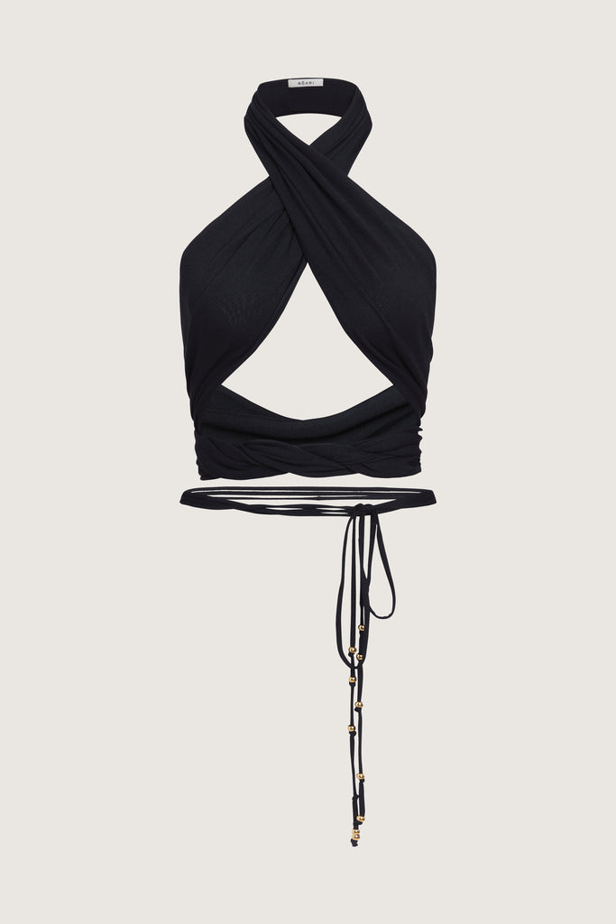 Black Jamie Wrap Create countless looks with this sustainable premium stretch modal wrap. Includes beaded piece to be paired as a belt, wrapped around neck, tied in hair....the possibilities are endless.