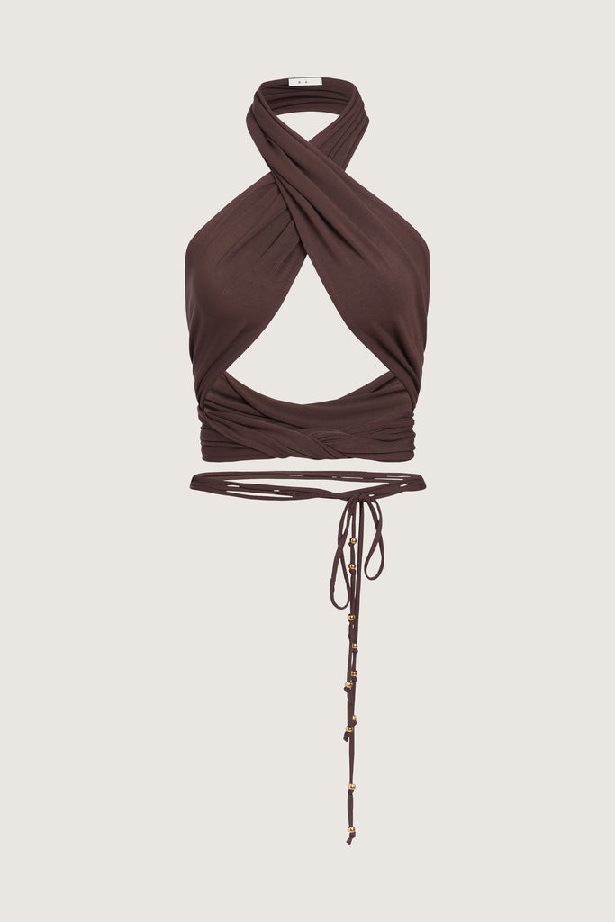 Muted Brown Jamie Wrap Create countless looks with this sustainable premium stretch modal wrap. Includes beaded piece to be paired as a belt, wrapped around neck, tied in hair....the possibilities are endless.