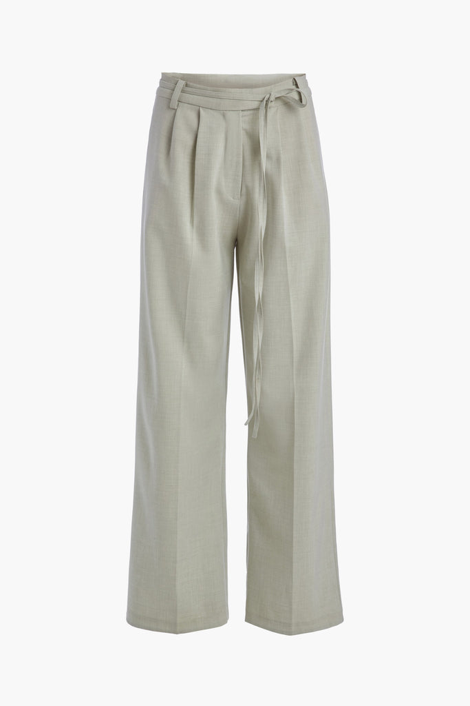 Sage KAT TROUSER Dual pleated mid-rise trousers featuring a straight, relaxed fit. Pockets at back with horn buttons. Includes a self-fabric detachable belt. *All sale merchandise is exchangeable for size only.