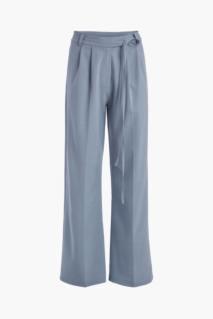 Stone Blue KAT TROUSER Dual pleated mid-rise trousers featuring a straight, relaxed fit. Pockets at back with horn buttons. Includes a self-fabric detachable belt. *All sale merchandise is exchangeable for size only.