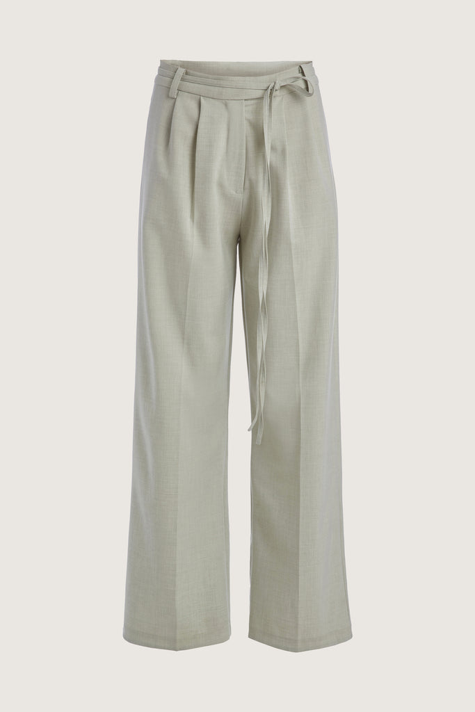 Sage Kat Trouser Dual pleated mid-rise trousers featuring a straight, relaxed fit. Pockets at back with horn buttons. Includes a self-fabric detachable belt. Style with The Rhodes Blazer  | Also available in BlackThis item is FINAL SALE.