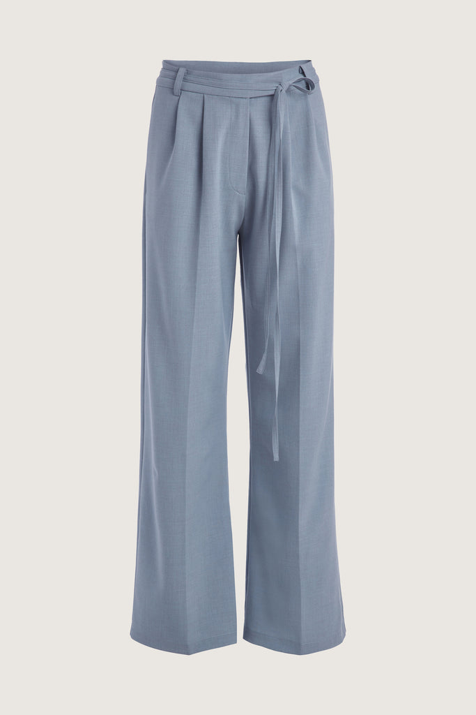 Stone Blue Kat Trouser Dual pleated mid-rise trousers featuring a straight, relaxed fit. Pockets at back with horn buttons. Includes a self-fabric detachable belt. Style with The Rhodes Blazer  | Also available in BlackThis item is FINAL SALE.