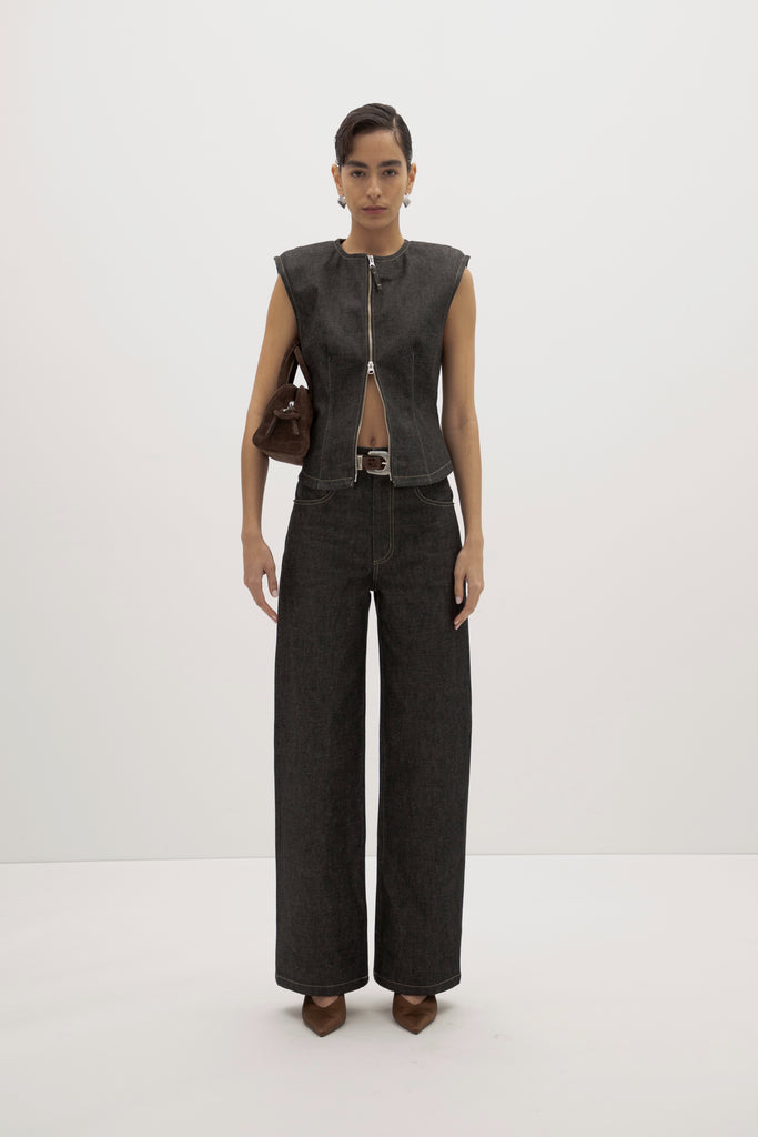 Raw Indigo Jane Jean -Relaxed fit with structured feel-High-rise contoured waistband-Curved yoke for sculpted fit-Zip-fly with custom ROARI button-Flat-felled seams and double-needle stitching-Reinforced self-doubled belt loops-Functional front and back pockets-Chain stitch interior-Raw indigo denimIngryd is 5'10